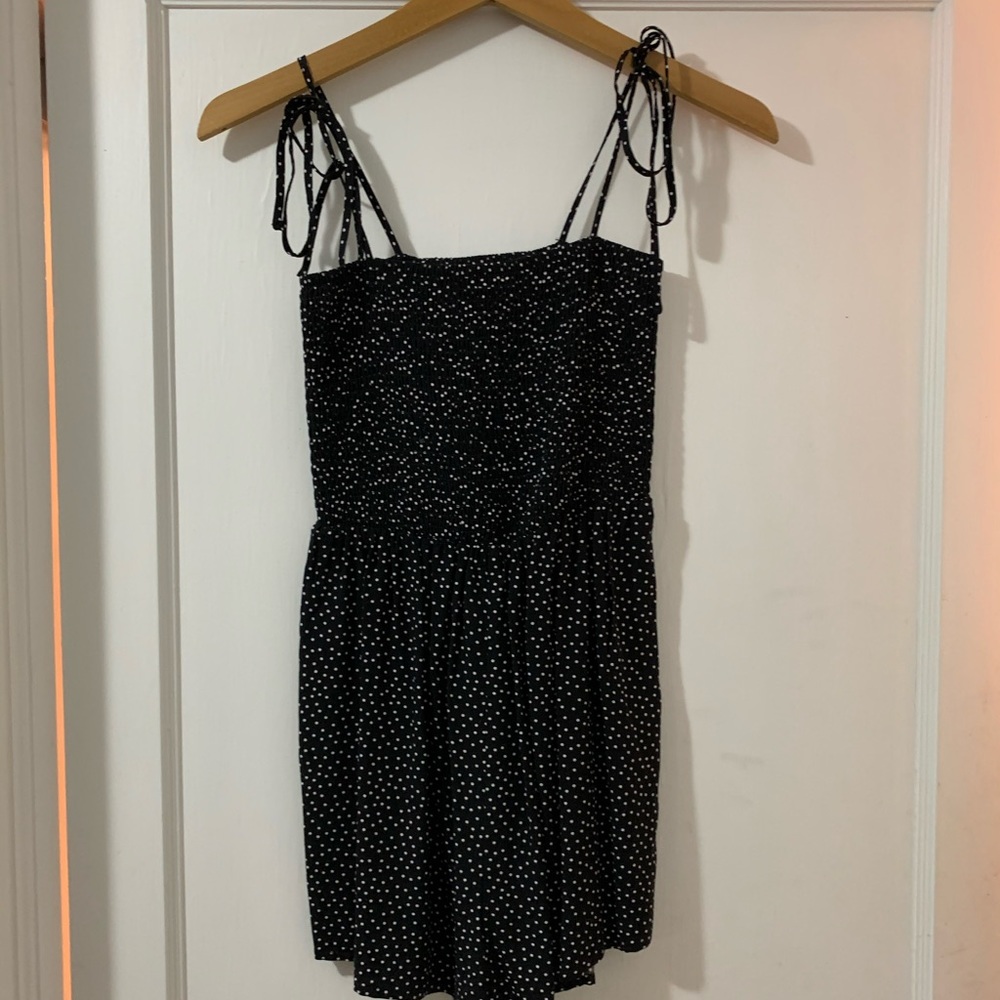 black romper with white polka dots